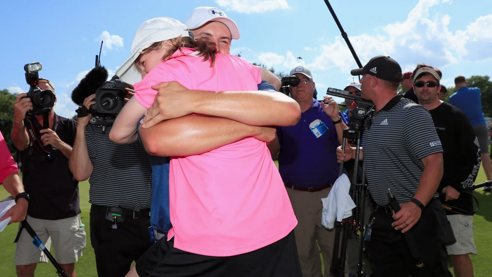 FORT WORTH, TX - MAY 29: Jordan Spieth hugs his sister, Ellie Spieth, after winning the DEAN & DELUCA Invitational at Colonial Country Club on May 29, 2016 in Fort Worth, Texas. (Photo by Tom Pennington/Getty Images)